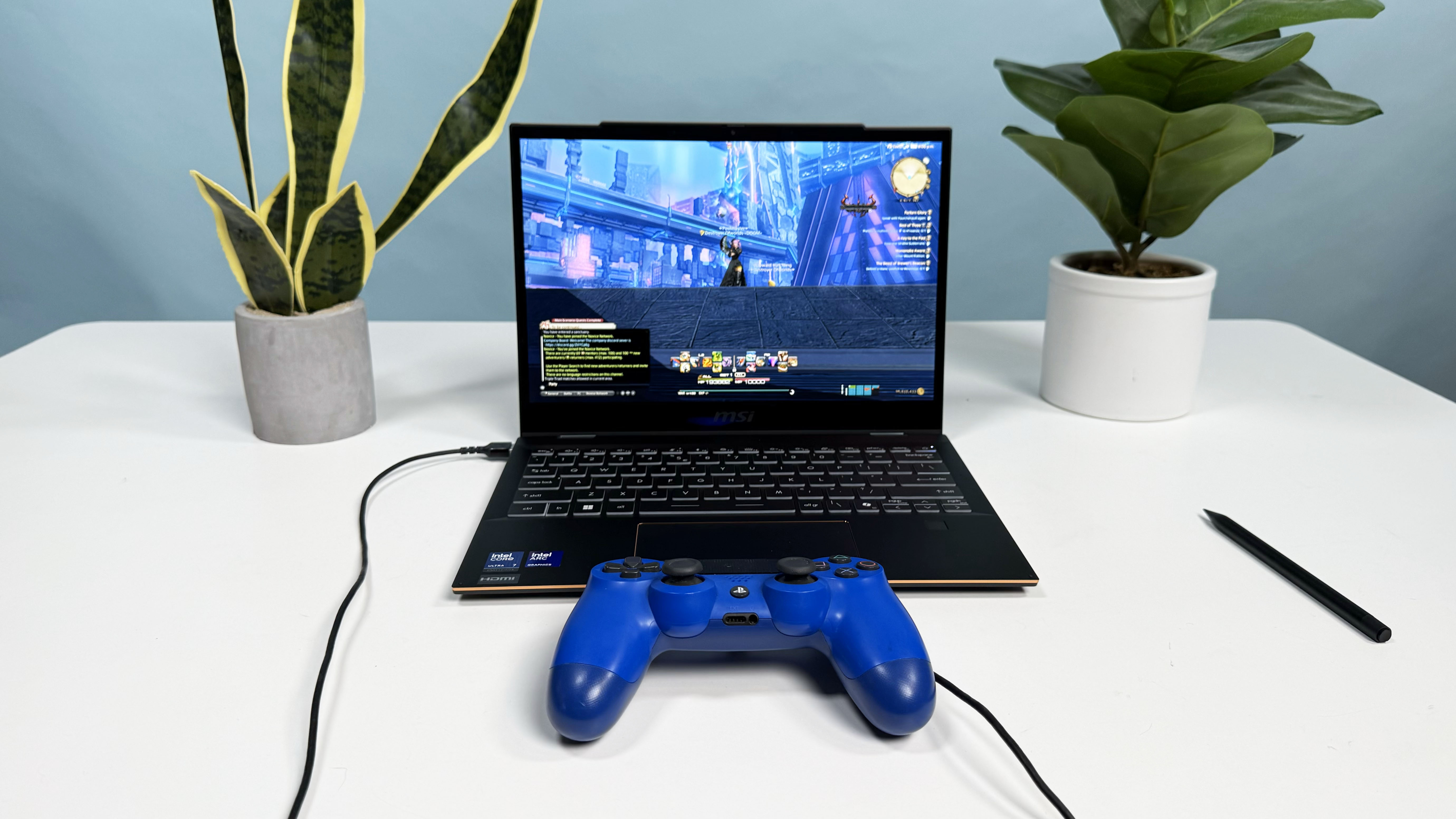 MSI Summit 13 AI+ Evo (A2VM) 2-in-1 AI PC laptop open on a white desk, against a blue backdrop.