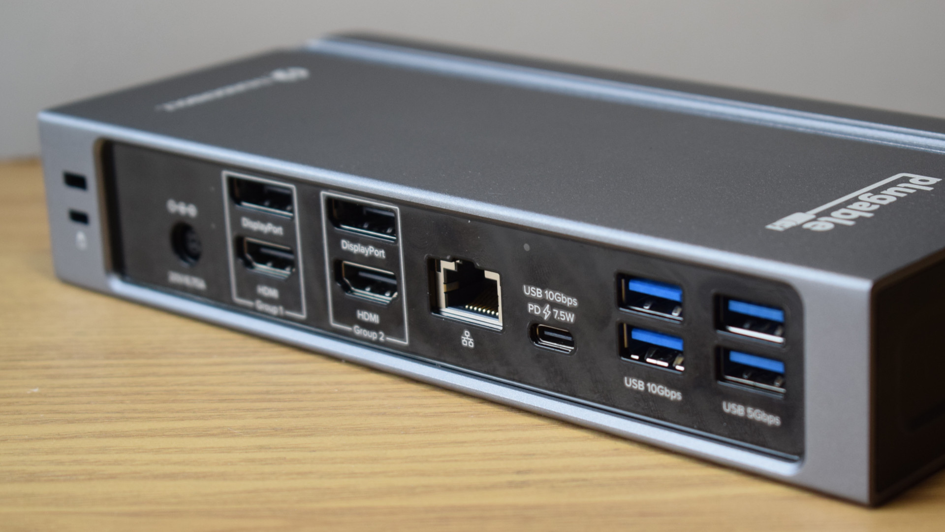 Photo of the Plugable Thunderbolt 4 & USB4 Quad Display Docking Station (TBT4-UDZ) showing the rear-facing ports of the dock.