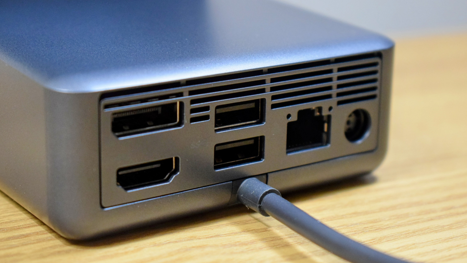 Close-up photo of the Dell Dual Charge Dock with QI wireless charging docking station showing its rear-facing ports.