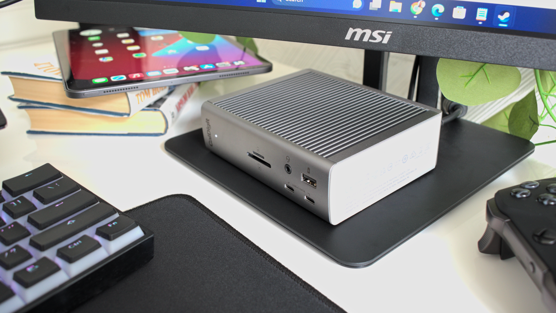 Wide shot of the CalDigit Thunderbolt Station 4 connected to an MSI monitor in horizontal orientation.